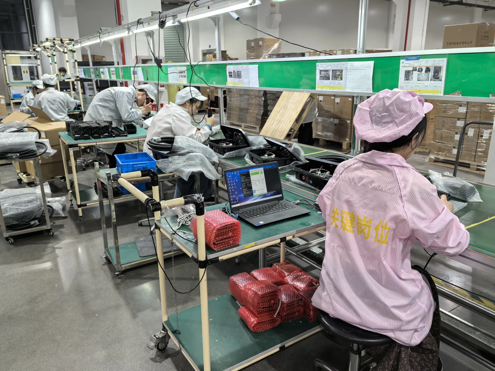 AC EV charger manufacturing and assembly line at Amprisen